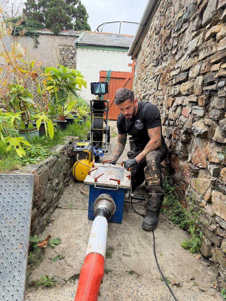 Devon Drainage Services engineer running a CCTV drain survey